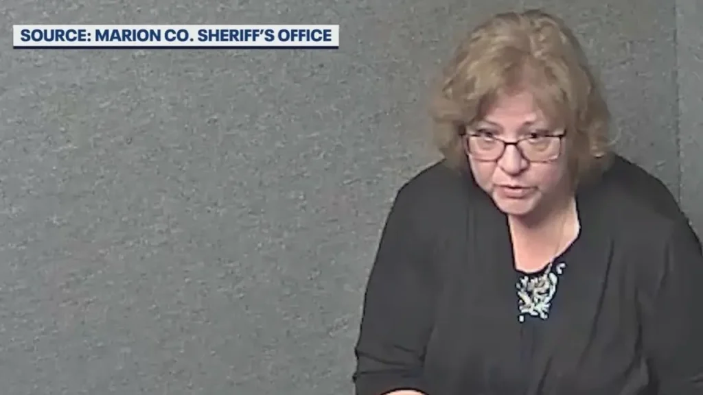 The Florida Sheriff's Office Shares Video Of A Woman Interrogated For Shooting Her Neighbor Dead Through A Door