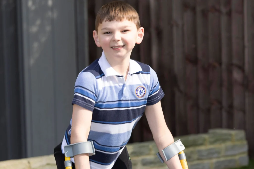 Boy, 10, has ‘miracle’ surgery to help him walk after losing legs due to horrific abuse by parents