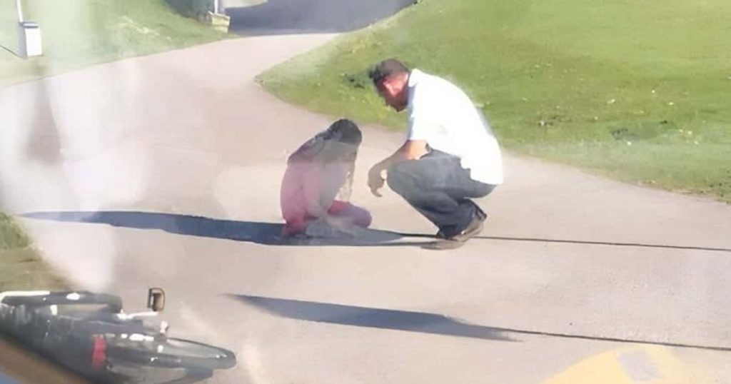 Bus driver sees girl crying in the street — he stops to comfort her after finding out she'd been bullied