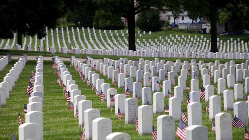 Graves decorated at Jefferson Barracks Cemetery